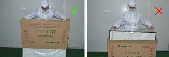 把高效過濾器慢慢倒出來，把紙箱放一邊查看高效過濾器是否損壞